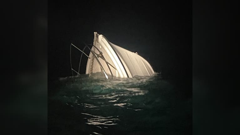 The bow of the ship three men had to abandon as it was taking on water pre-dawn on Saturday 22 June.