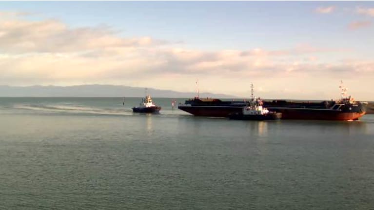 The Manahau arrives in Nelson Harbour following a 315km tow from Westport.