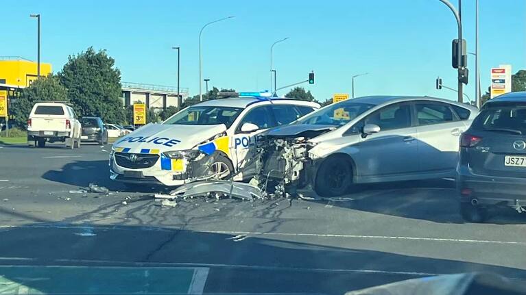 The police car was on its way to a separate incident when the crash happened. (Source: Andre Marsh).
