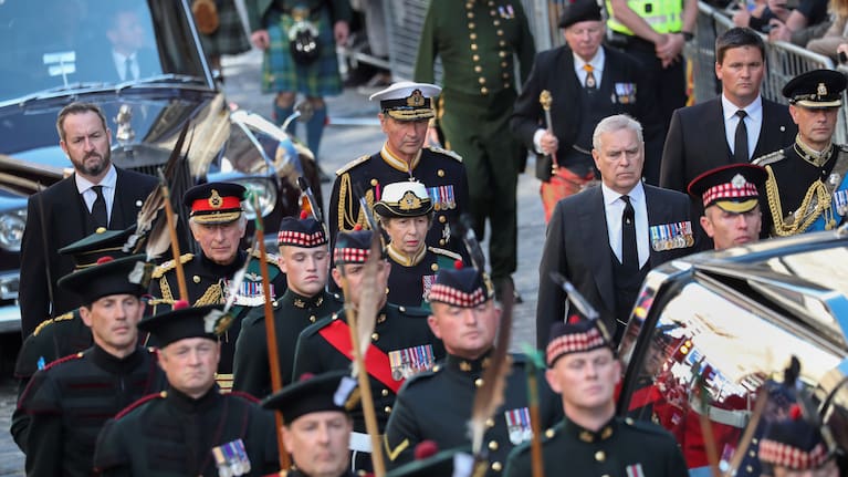 The procession with the coffin of Queen Elizabeth II, followed by, from left, King Charles III, Princess Anne, Prince Andrew, and Prince Edward.