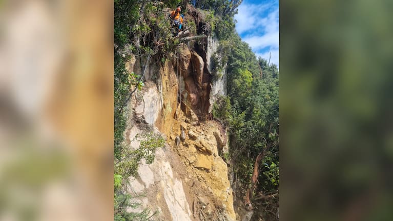 The slope above SH6 after "rock popping using airbags to remove unstable features".