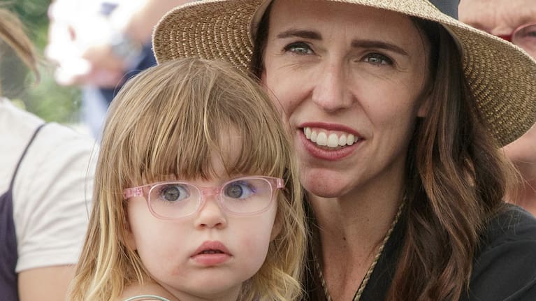 Then Prime Minister Jacinda Ardern with Neve at Waitangi, 2021.