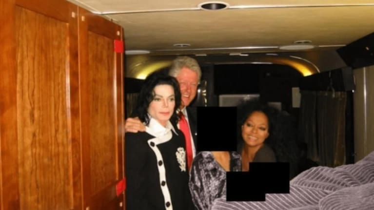 This redacted photo released by the U.S. Department of Justice shows Micheal Jackson, former US President Bill Clinton and Diana Ross