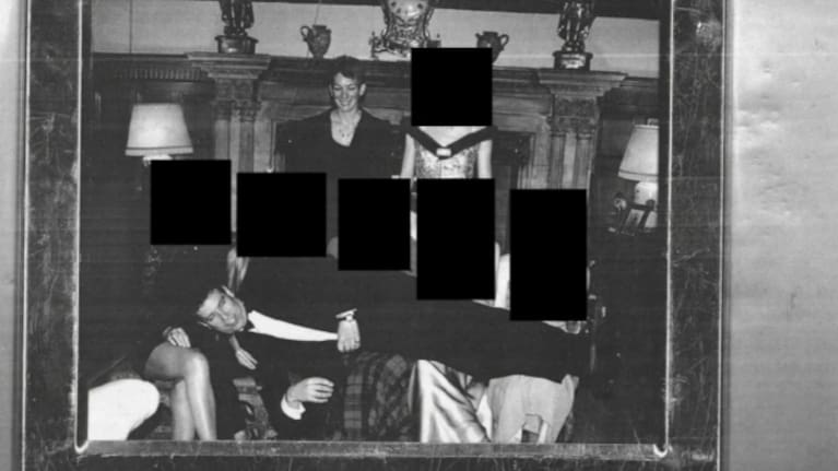 This redacted photo released by the U.S. Department of Justice shows disgraced prince Andrew Mountbatten-Windsor, pictured laying across five women’s laps with Ghislaine Maxwell standing in the background