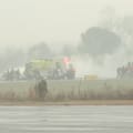 This screengrab made from video provided by WSOC shows firefighting crews responding to a reported plane crash at a regional airport in Statesville, North Carolina.