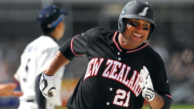Thomas Makea celebrates after a homerun against Japan at the 2013 Men's Softball World Championships in Auckland.