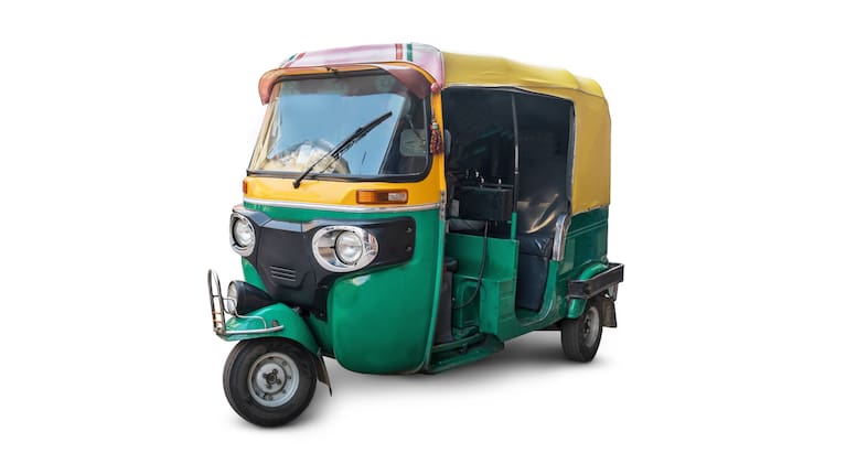 the autorickshaw isolated on white background. Traditional Indian public transport.