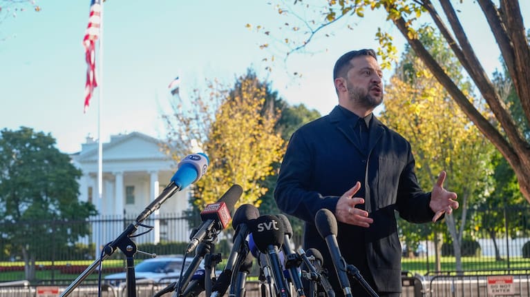 Ukraine's President Volodymyr Zelensky speaks to reporters in Lafayette Park across the street from the White House, following a meeting with President Donald Trump.