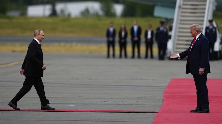 US President Donald Trump greets Russia's President Vladimir Putin at Joint Base Elmendorf-Richardson, Alaska.
