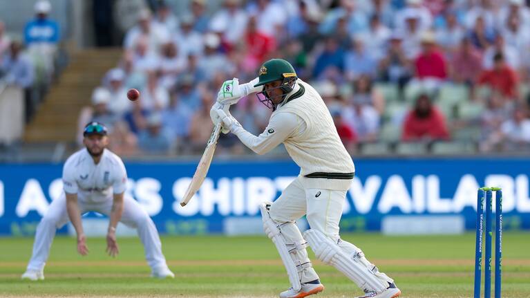 Usman Khawaja scores runs for Australia during the Ashes series against England last year.