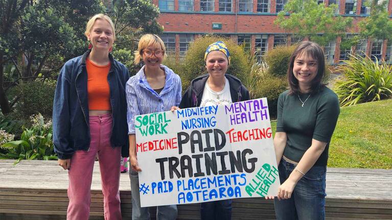 Victoria University of Wellington students, including Bex Howells, celebrating the launch of PPA's petition.