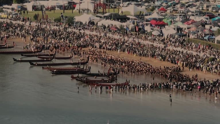 Waka parade in front of Te Tii marae.