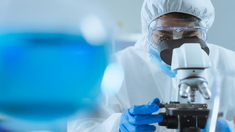 File image: Scientists work in a lab.