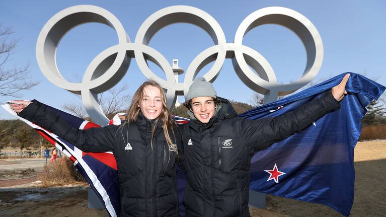 Zoi Sadowski-Synnott and Nico Porteous pose after their gold medal wins at the Beijing Games.